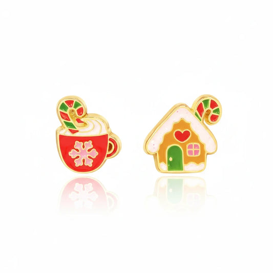 Seaside Custom Apparel & Gifts holiday earrings featuring a hand-painted enamel hot cocoa mug and gingerbread house.