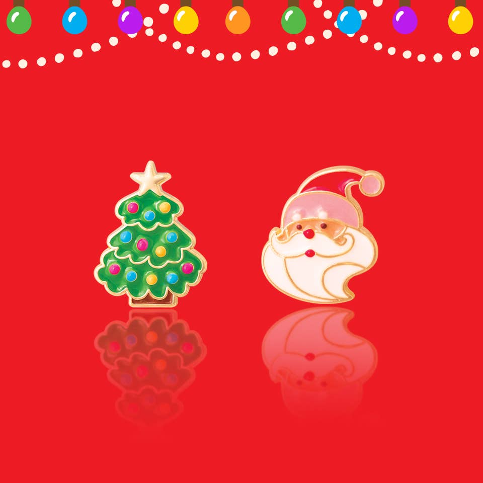 Seaside Custom Apparel & Gifts Christmas tree and Santa Claus enamel earrings for kids on a festive red background.