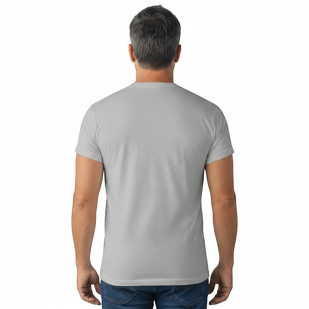 Back view of a man wearing a plain grey Seaside Custom Apparel & Gifts unisex t-shirt with blue jeans