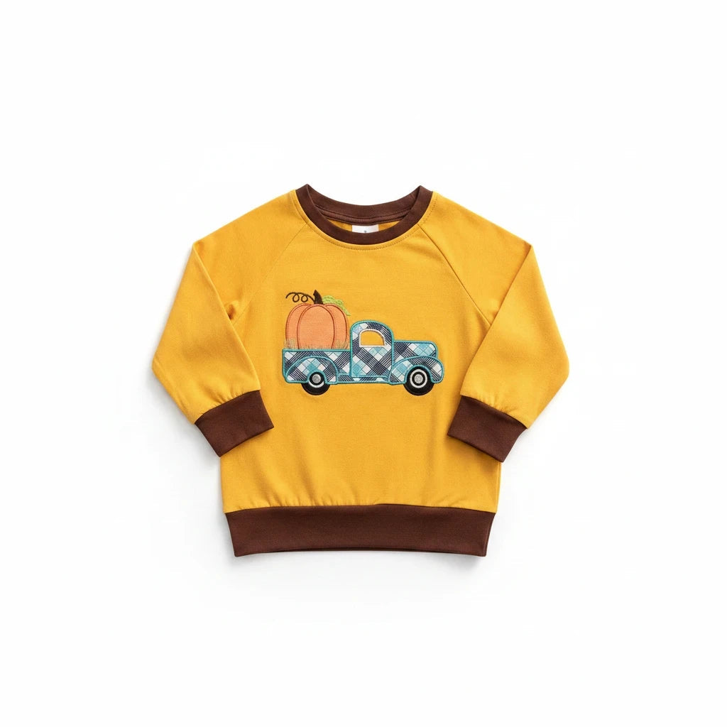 Seaside Custom Apparel & Gifts boys mustard yellow long sleeve shirt with a plaid truck and pumpkin graphic.