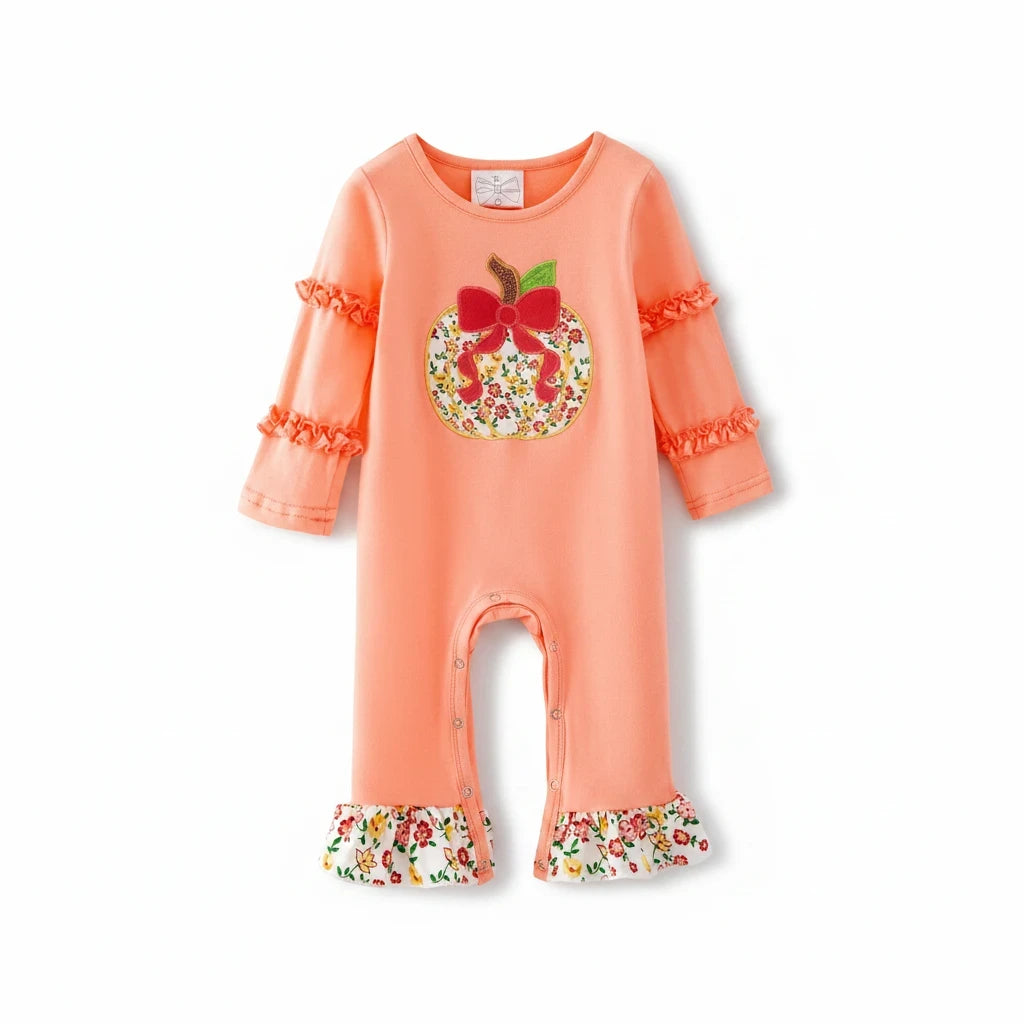 Seaside Custom Apparel & Gifts peach baby romper with floral pumpkin applique, ruffle sleeves, and floral leg ruffles.