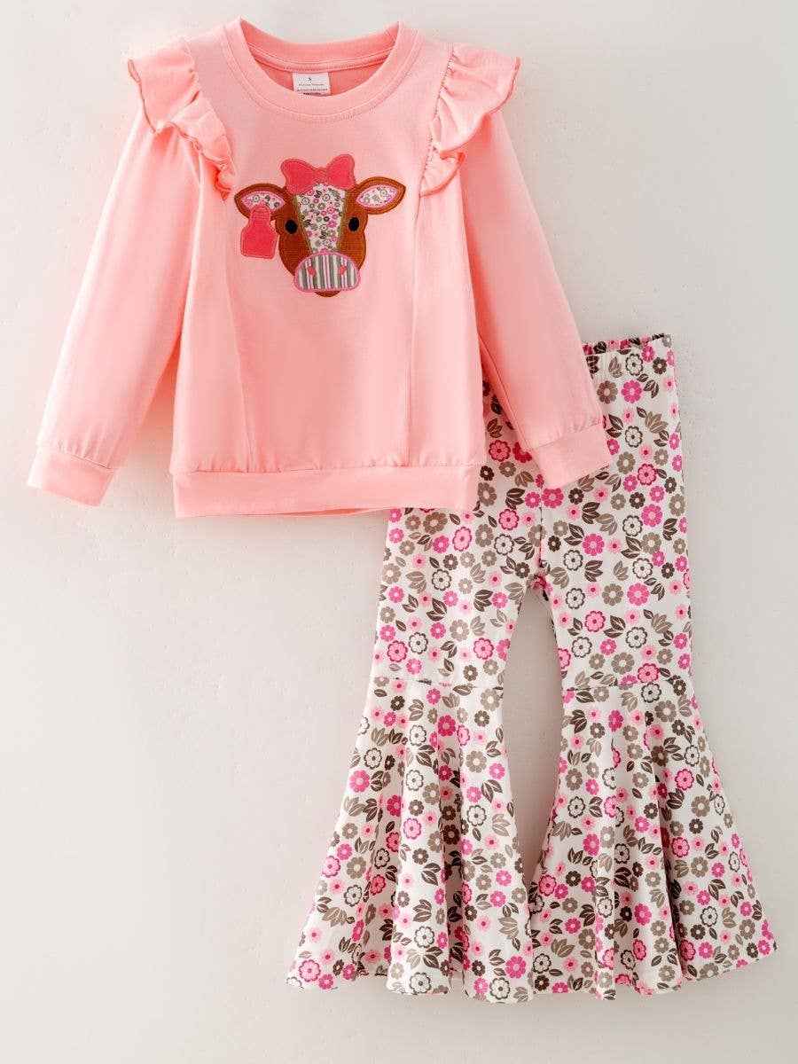Seaside Custom Apparel & Gifts pink long sleeve top with floral cow applique and matching floral bell bottom pants
