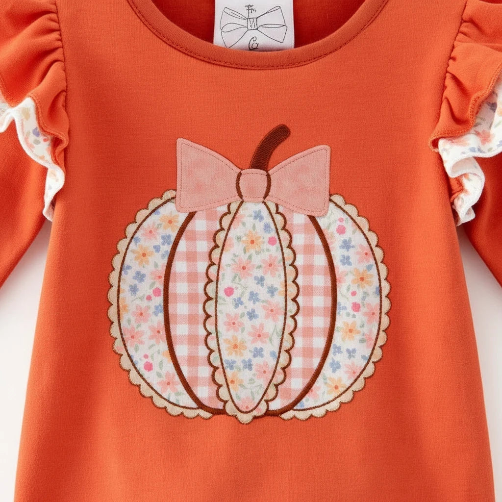Seaside Custom Apparel & Gifts infant romper in pumpkin spice orange with a floral pumpkin applique and ruffle sleeves