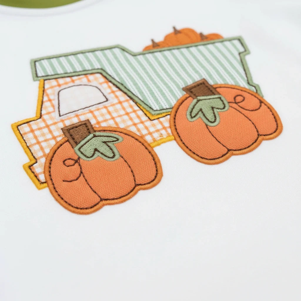 Seaside Custom Apparel & Gifts raglan shirt featuring a detailed embroidered harvest truck carrying orange pumpkins.