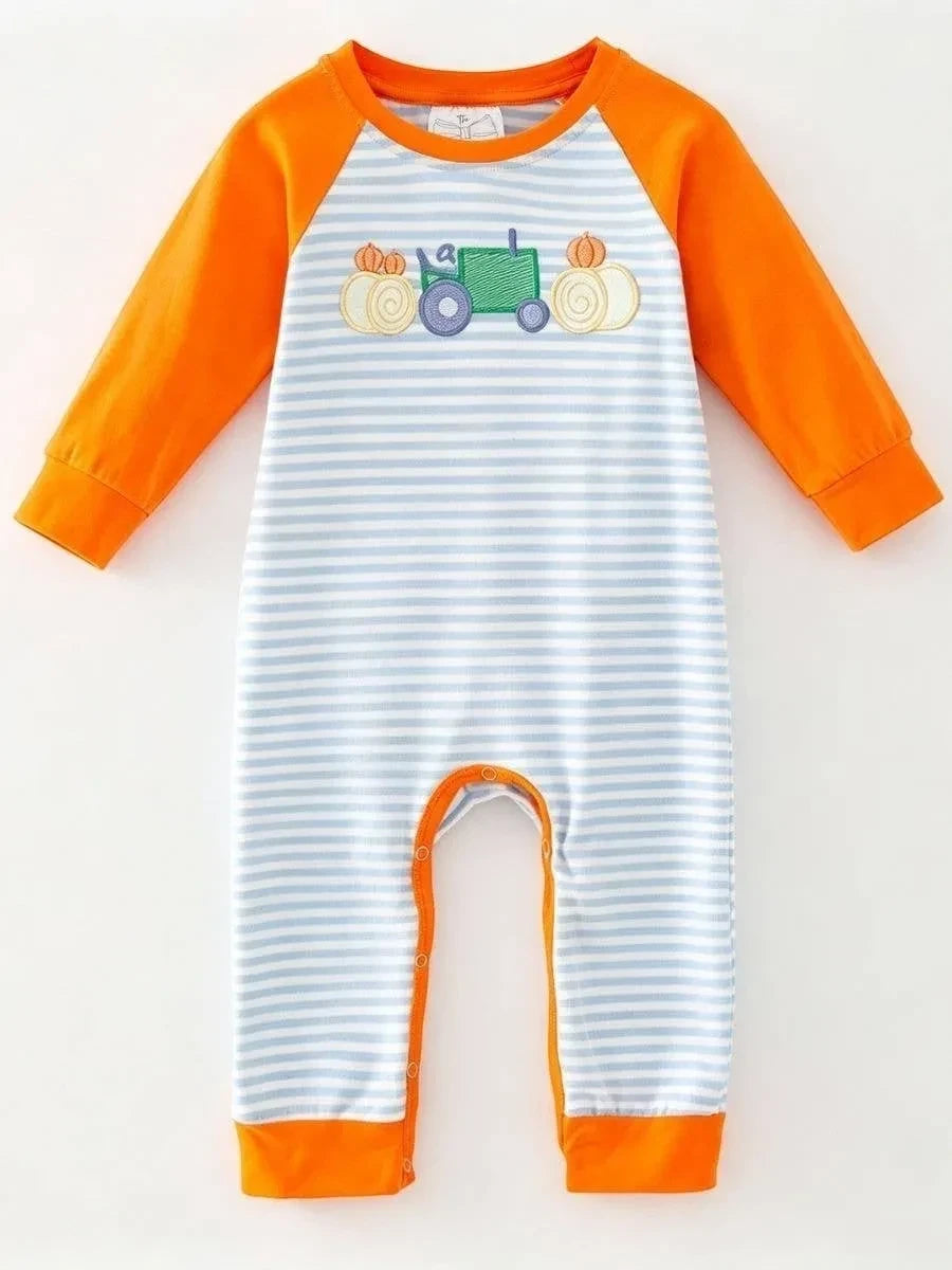 Seaside Custom Apparel & Gifts infant romper with blue stripes, orange raglan sleeves, and embroidered tractor design.